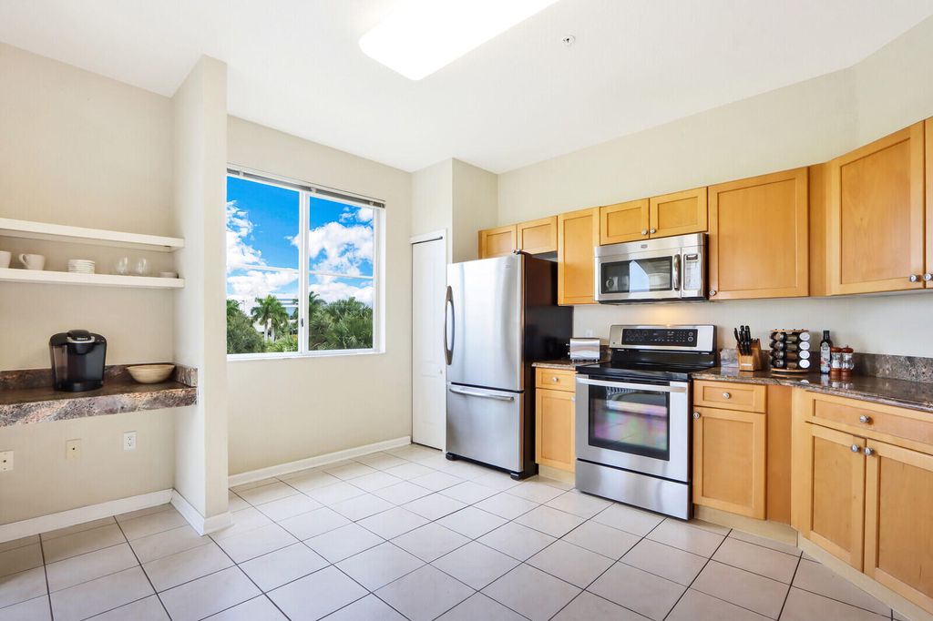 Photo of 11021 Legacy Lane #303, Palm Beach Gardens, FL 33410 (MLS # B26022935)
