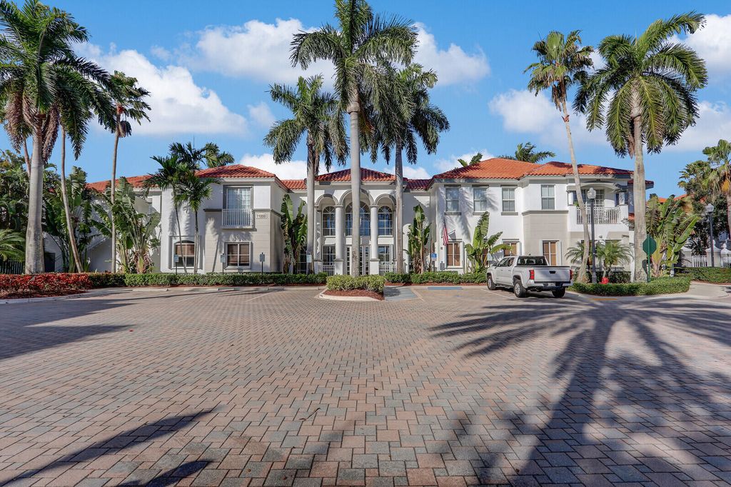 Photo of 11021 Legacy Lane #303, Palm Beach Gardens, FL 33410 (MLS # B26022935)