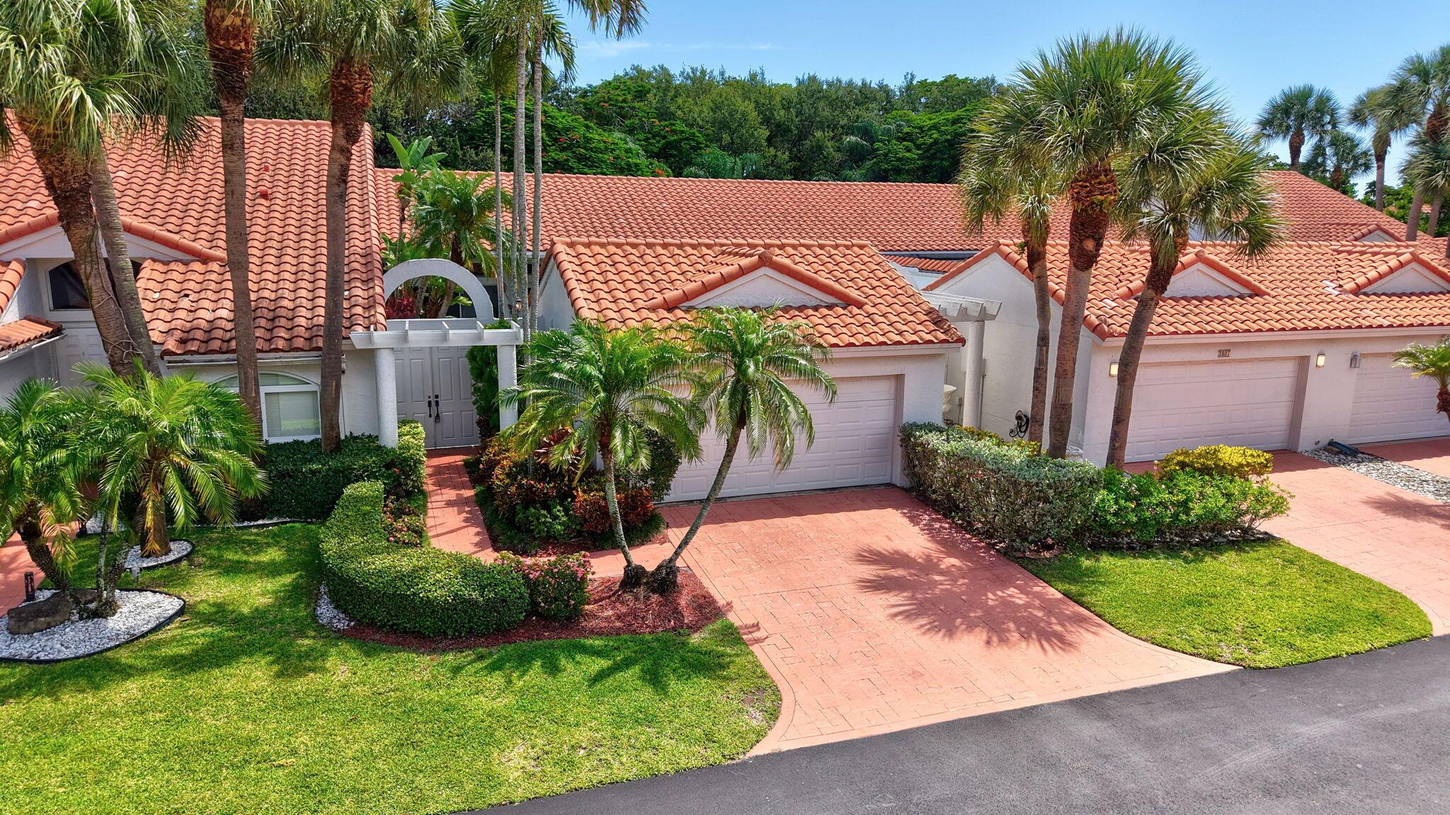 DESIRABLE SINGLE-STORY 3BR/2BA COURTYARD HOME WITH PRIVATE SPLASH POOL IN CANDLEWOOD AT BOCA COUNTRY CLUB! NEARLY EVERY ROOM OPENS TO THE POOL, WITH SOARING CEILINGS AND A BRIGHT, AIRY FEEL. 2-CAR GARAGE INCLUDES WASHER/DRYER. LIVE COMFORTABLY AS-IS OR UPDATE TO YOUR TASTE. THIS HOME IS READY TO ENJOY OR TAKE ADVANTAGE OF THIS WELL PRICED OPPORTUNITY TO UPGRADE AND MAKE IT A SHOW-STOPPER. HOA MAKES LIFE EASY COVERING ROOF MAINTENANCE, INSURANCE, EXTERIOR PAINTING, LANDSCAPING, CABLE, AND 24/7 MANNED GATE. PRIME LOCATION NEAR BEACHES, DOWNTOWN BOCA & DELRAY, AND I-95. STEPS FROM BOCA RATON GOLF PUBLIC COURSE. NO MANDATORY MEMBERSHIP, ALTHOUGH, DISCOUNTED FOR RESIDENTS. ZONED FOR TOP SCHOOLS: CALUSA ELEM, OMNI MIDDLE, SPANISH RIVER HIGH. PERFECT FOR SNOWBIRDS OR YEAR-ROUND LIVING!