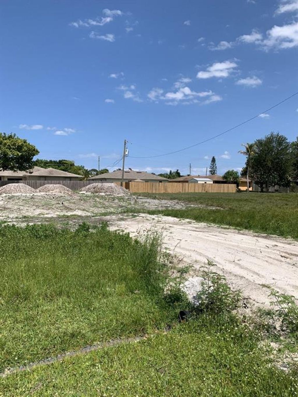 Photo of 582 SE Damask Avenue, Port Saint Lucie, FL 34983 (MLS # R10714661)