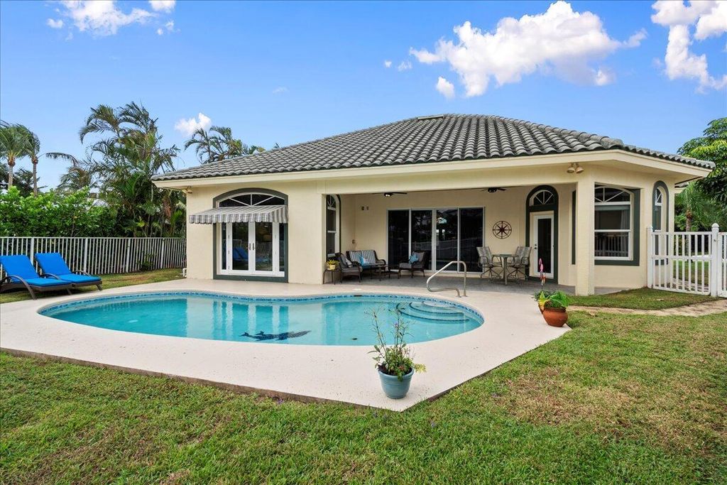Photo of 72 Waterway Road, Jupiter, FL 33469 (MLS # B26022952)