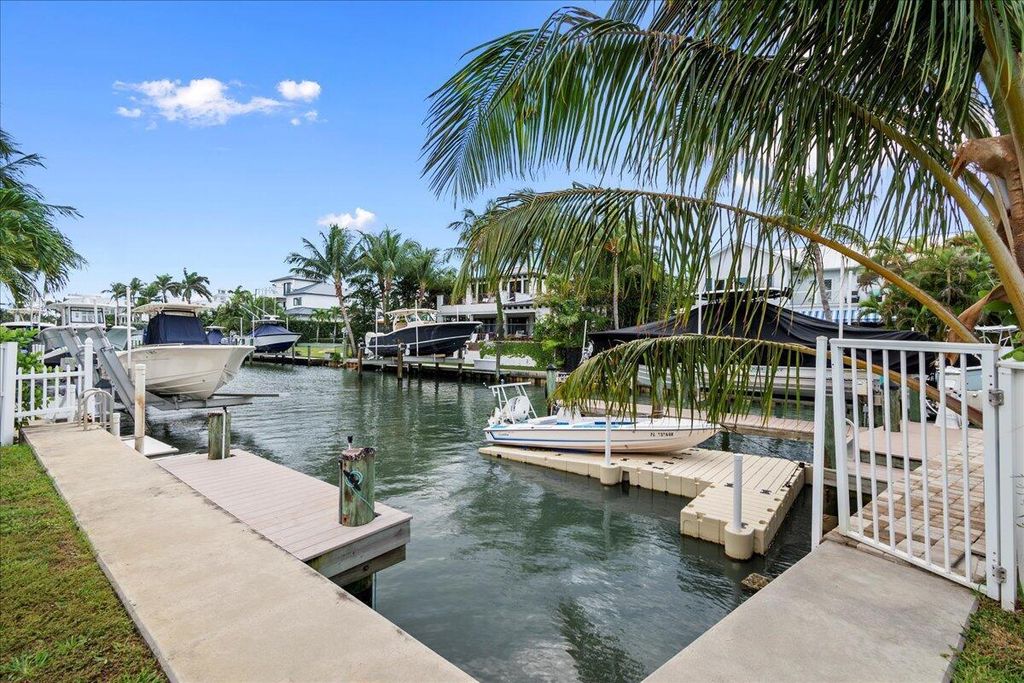 Photo of 72 Waterway Road, Jupiter, FL 33469 (MLS # B26022952)