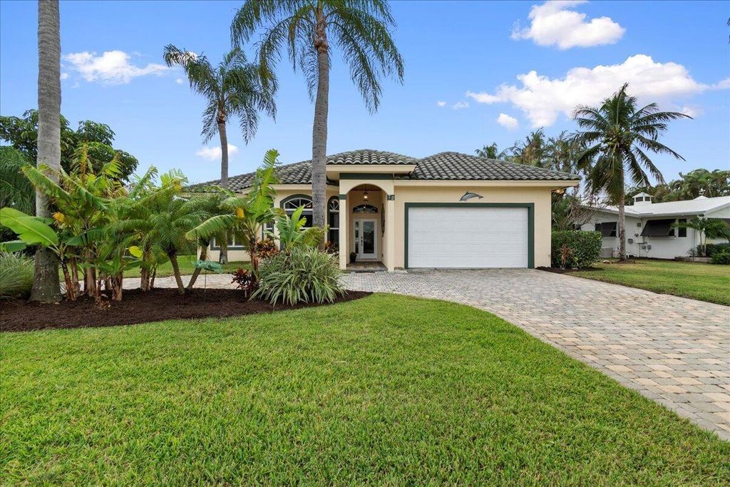 Photo of 72 Waterway Road, Jupiter, FL 33469 (MLS # B26022952)