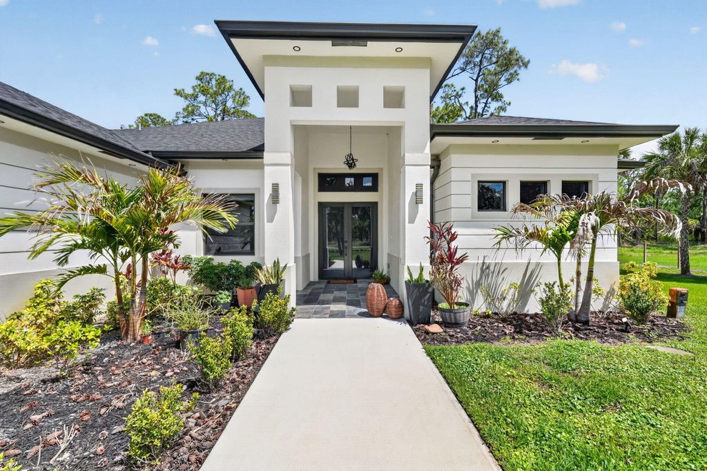 Photo of 3263 SE 40th Ave Avenue SE, Naples, FL 34117 (MLS # B26016078)