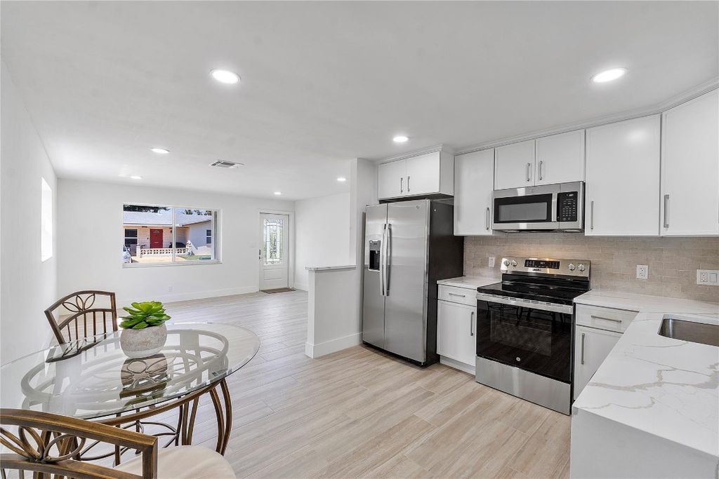 Photo of 4918 NW 56th Court, Tamarac, FL 33319 (MLS # F10538373)