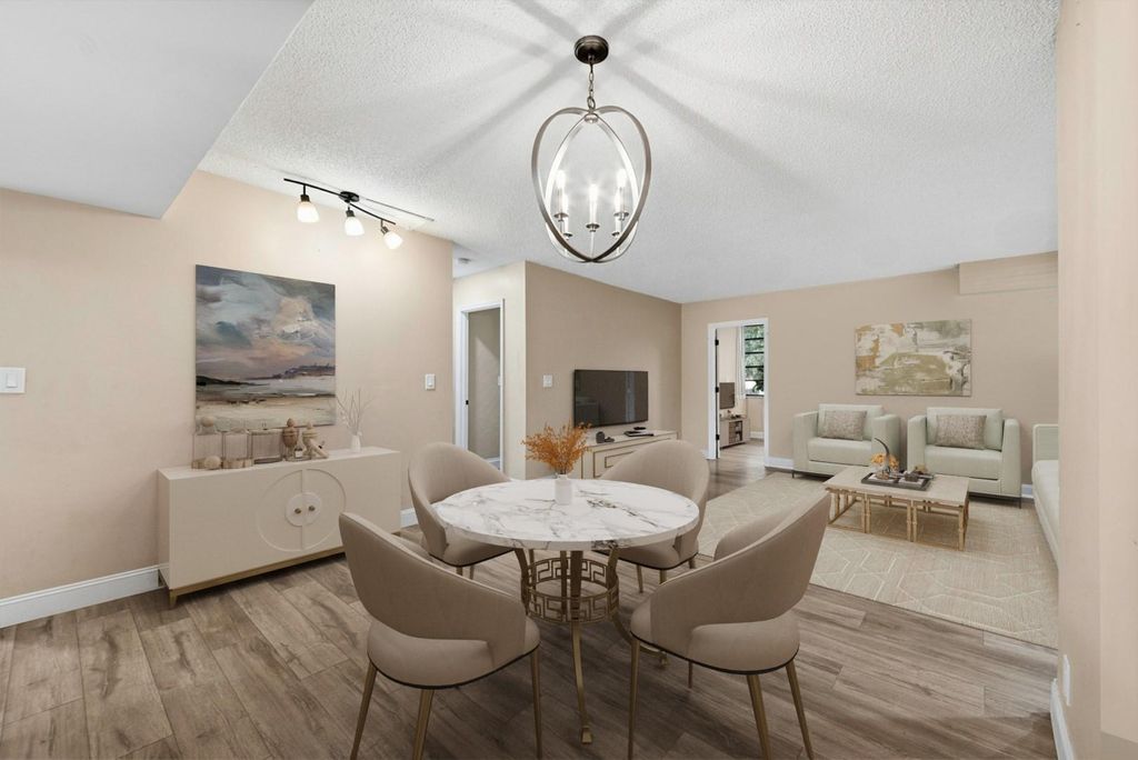 Photo of 3100 NW 42nd Ave #D201, Coconut Creek, FL 33066 (MLS # F10539343)