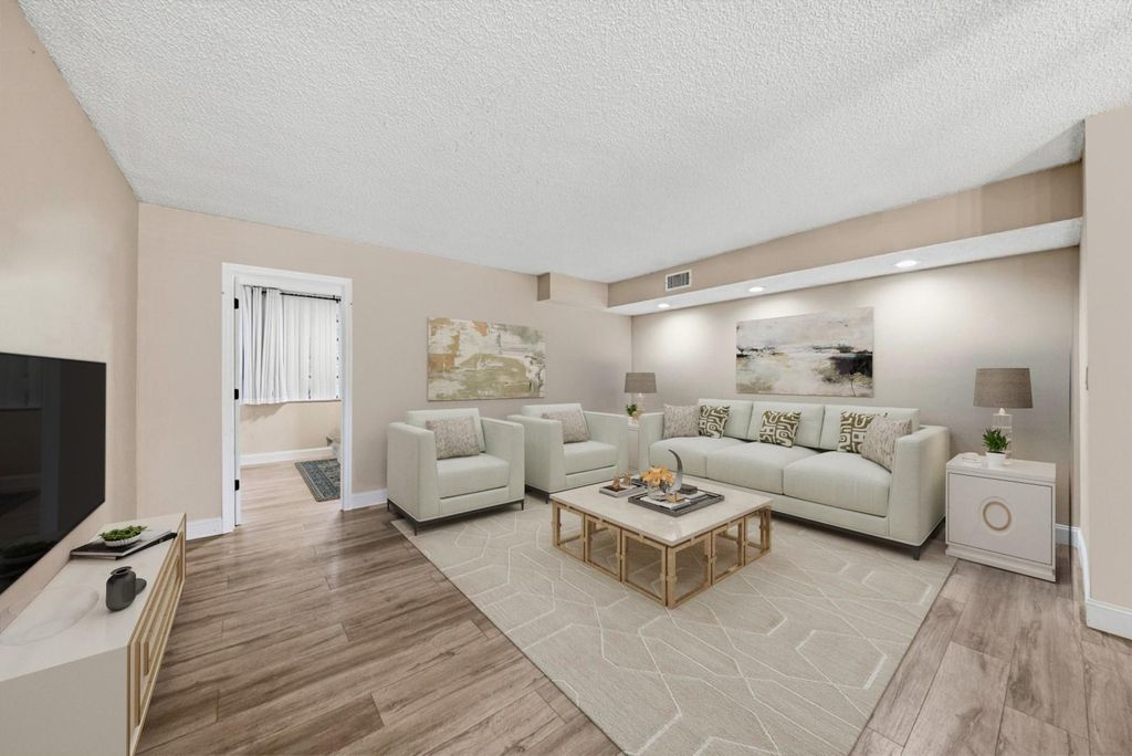 Photo of 3100 NW 42nd Ave #D201, Coconut Creek, FL 33066 (MLS # F10539343)