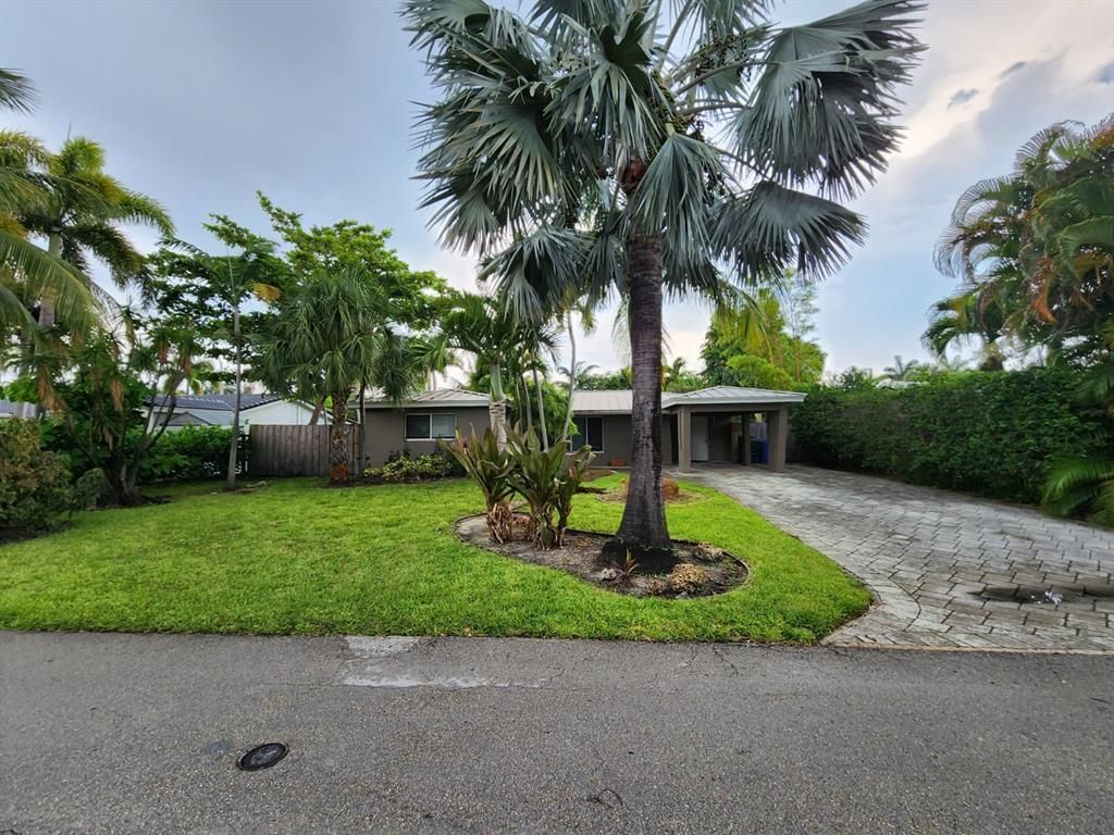 Photo of 4411 NE 15th Way, Oakland Park, FL 33334 (MLS # R11154197)