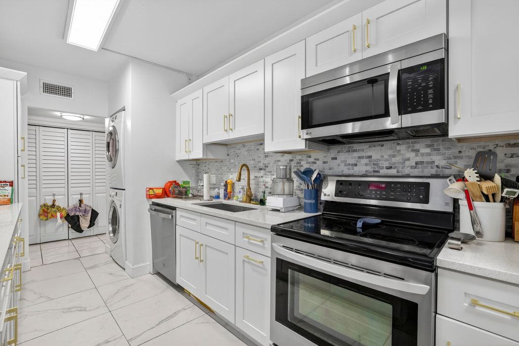 Photo of 6328 W Longboat Ln Lane W #101, Boca Raton, FL 33433 (MLS # B26027185)