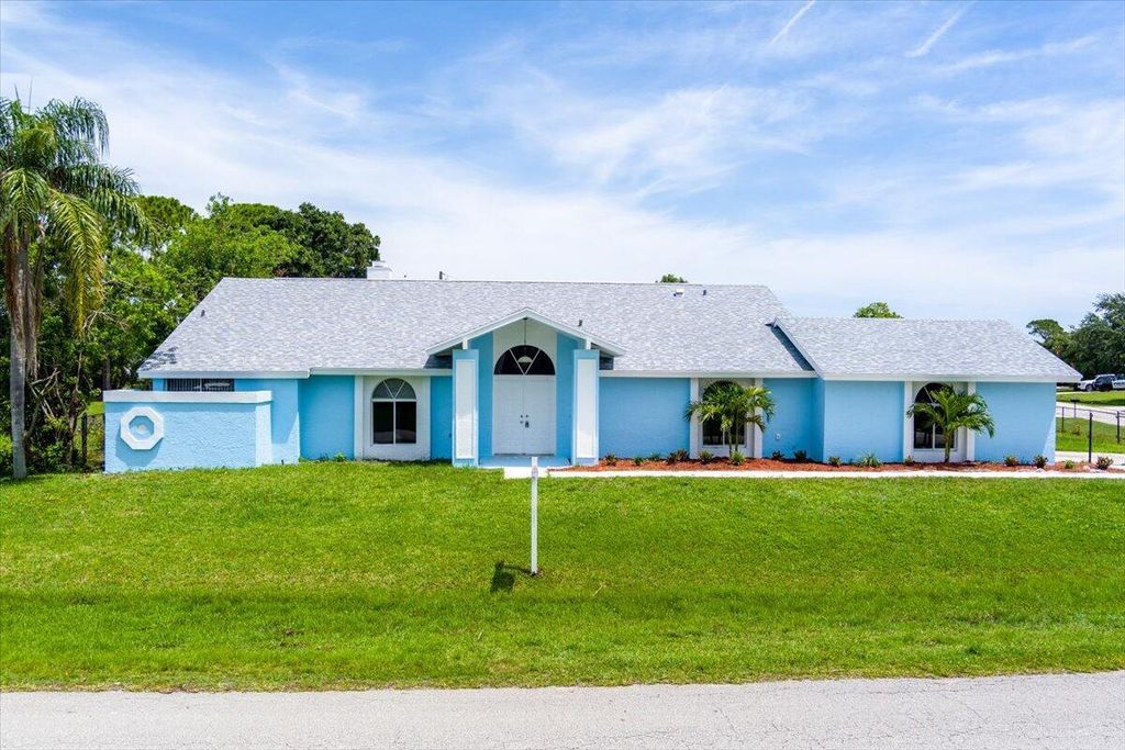 Photo of 2431 SE Sapelo Avenue, Port Saint Lucie, FL 34952 (MLS # R10947736)