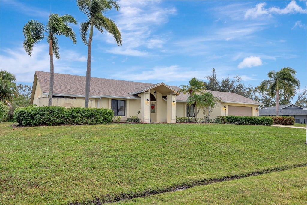 Photo of 1797 SE Canora Road, Port Saint Lucie, FL 34952 (MLS # R11073004)
