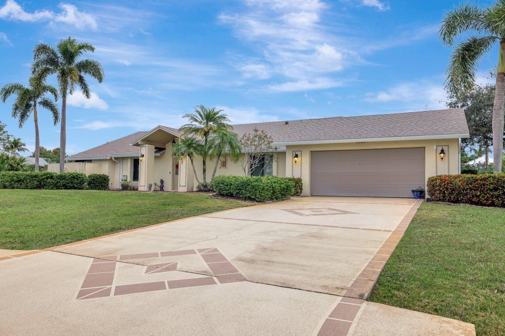 Photo of 1797 SE Canora Road, Port Saint Lucie, FL 34952 (MLS # R11073004)