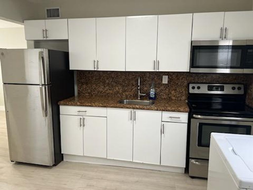 Photo of 154 Bacom Point Road, Pahokee, FL 33476 (MLS # R10920511)