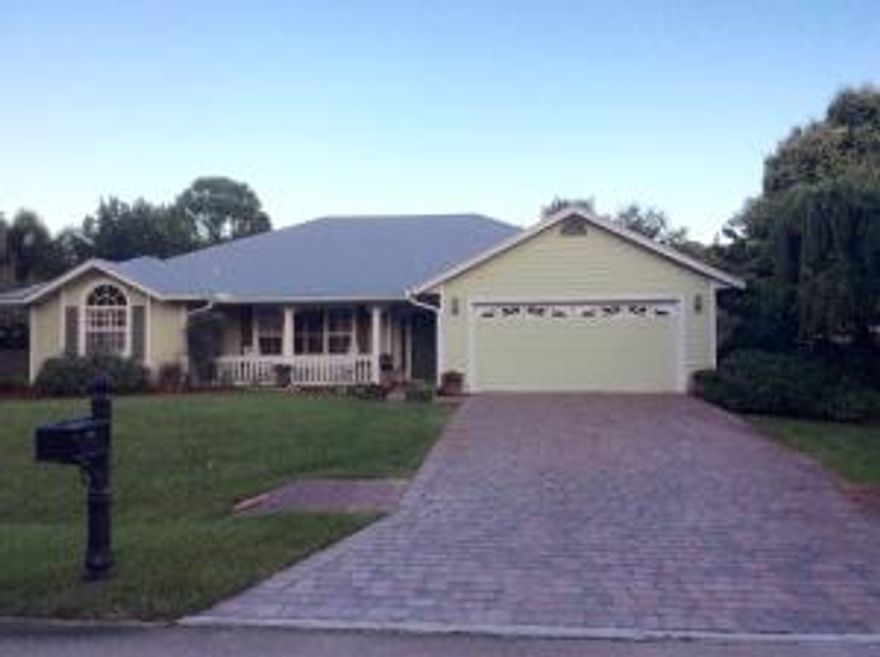 Beautiful, move in ready, Key West style home  on a lovely quiet street is within walking distance to stores and Palm city schools. Home features plantation shutters, French doors, Brazilian Cherry hardwood floors,  upgraded kitchen with unique beautiful granite.  Spacious deck for entertaining in the lush private yard. Quick access to I-95 and the Florida turnpike.
