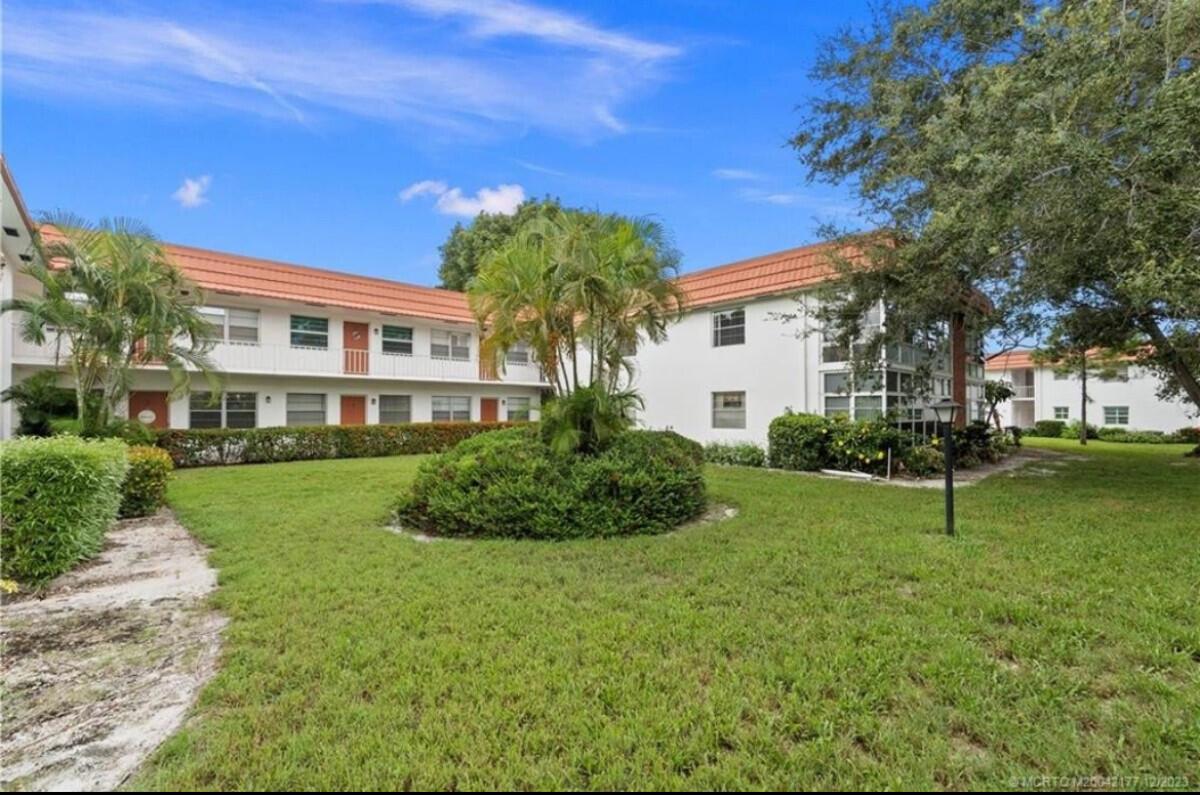 First Floor End Unit Light and Bright 2/2 with lots of upgrades including non slip tile floors throughout.
