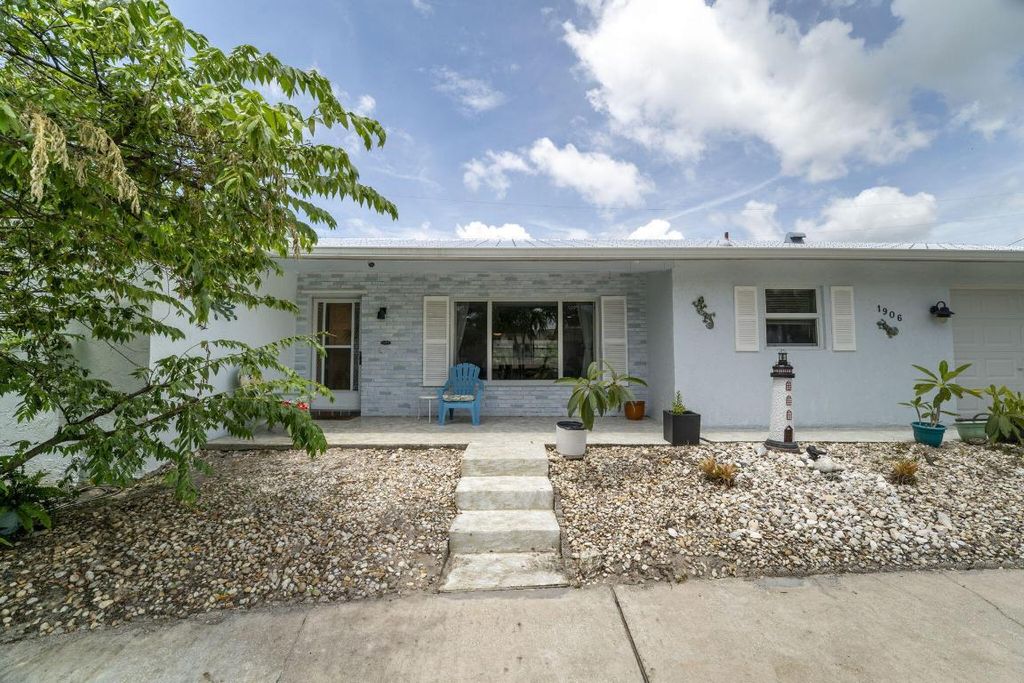 Photo of 1906 NE Media Avenue, Jensen Beach, FL 34957 (MLS # R11107792)