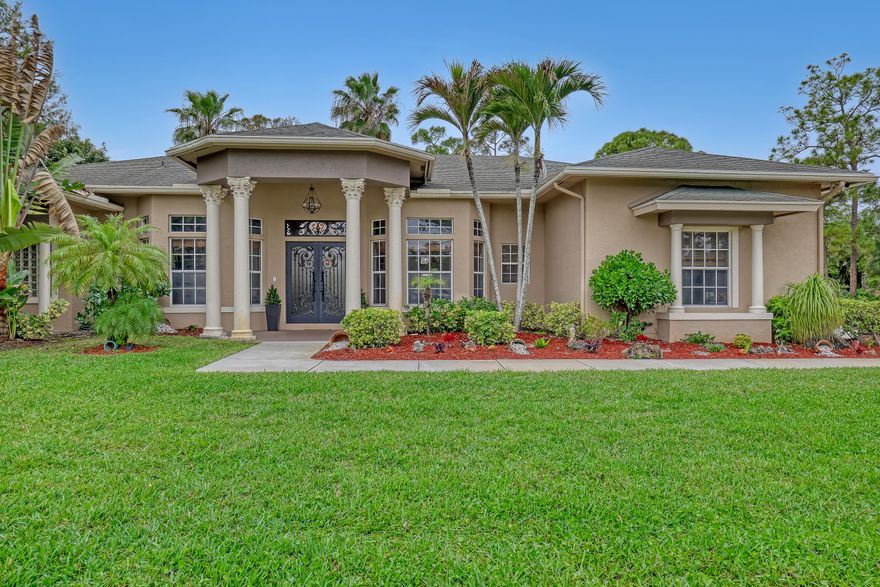 Beautiful home on a spacious lot featuring custom impact iron double entry doors. Upgraded kitchen with stainless steel appliances, wood cabinets, and granite countertops. Plantation shutters throughout. Enjoy outdoor living with a summer kitchen and built-in speaker sound system—perfect for entertaining. This residence features 2 A/C'S huge master bedroom and bath, with 2 walk-in closets, huge back patio for entertainment etc... too many extras to list hurry a must see......