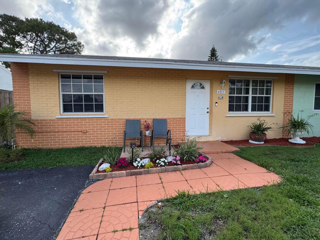 Photo of 4815 Gladiator Circle, Greenacres, FL 33463 (MLS # B26024198)