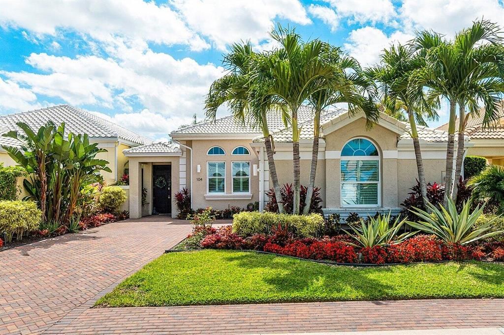 Photo of 104 Coral Cay Drive, Palm Beach Gardens, FL 33418 (MLS # R10875889)