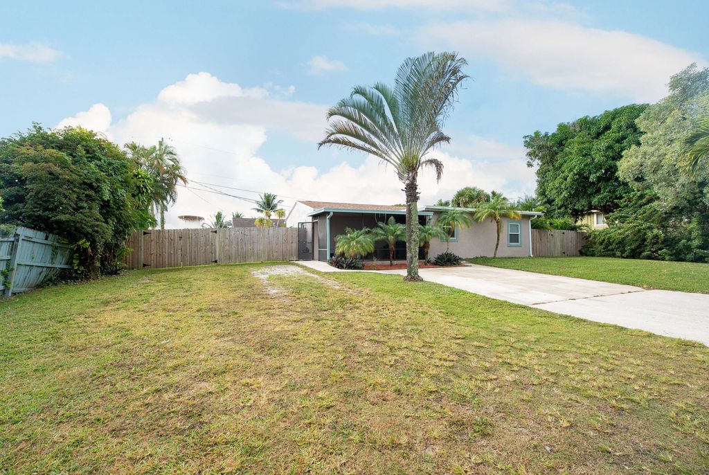 Photo of 9200 Brandy Lane Ln, Lake Worth Beach, FL 33467 (MLS # R10773137)