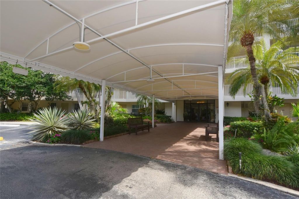 Photo of 800 Cypress Grove Drive #206, Pompano Beach, FL 33069 (MLS # F10426707)