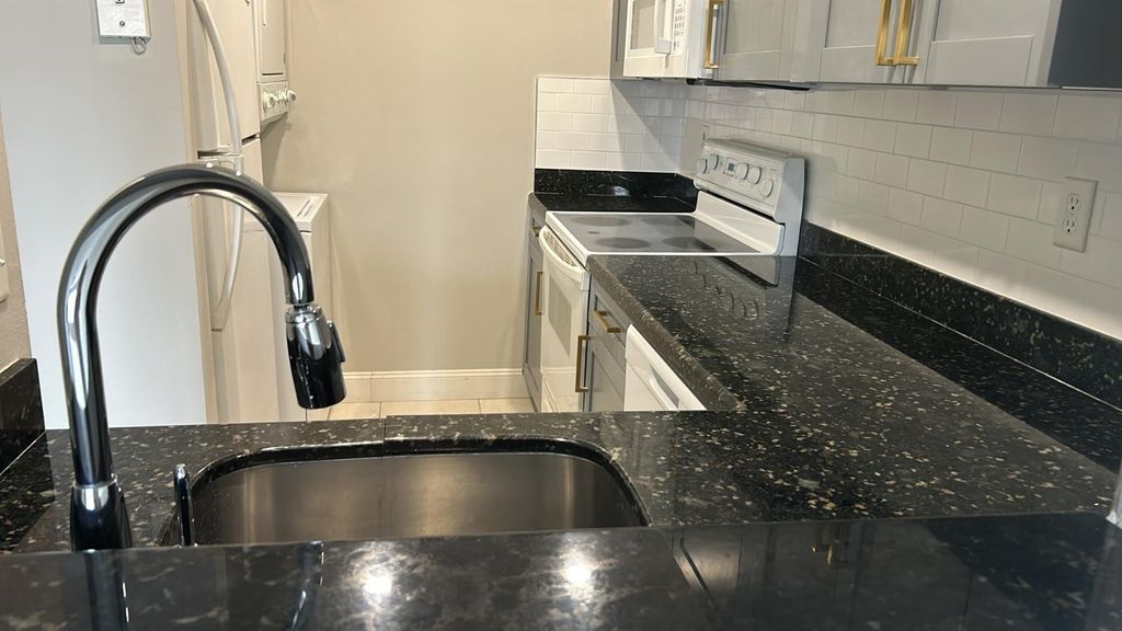 Photo of 3662 N University Drive #F-7, Coral Springs, FL 33065 (MLS # B26019426)