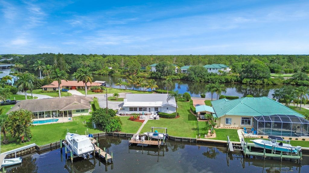 Photo of 481 SW Pine Tree Lane, Palm City, FL 34990 (MLS # R10984123)