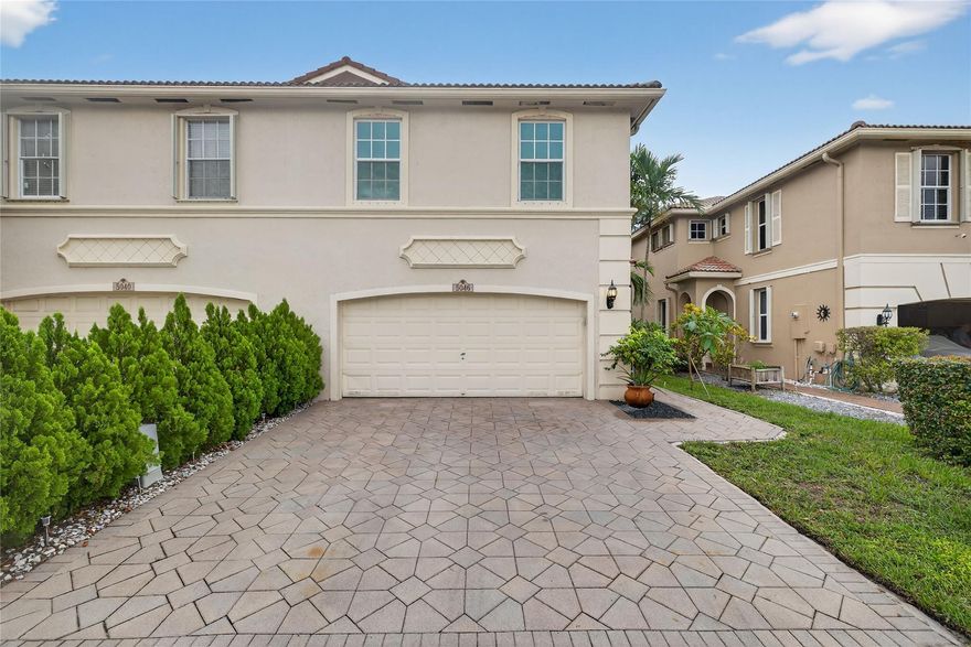 Beautiful lakefront corner townhome in Banyan Trails! This spacious 3-bedroom residence is loaded with upgrades. Enjoy cooking in the modern kitchen with granite countertops, stainless-steel appliances, and ample cabinet space. Retreat to the luxuriously remodeled master bath featuring elegant finishes. The master bedroom also offers a large walk-in closet for plenty of storage. The entire house features impact windows and an impact front door for safety and energy efficiency. Other updates include upgraded washer and dryer, newer high-efficiency AC, and water heater for comfort and savings. The community offers two sparkling pools and a clubhouse—perfect for relaxation and entertaining. Don’t miss the perfect blend of style, convenience, and location in this stunning townhome!