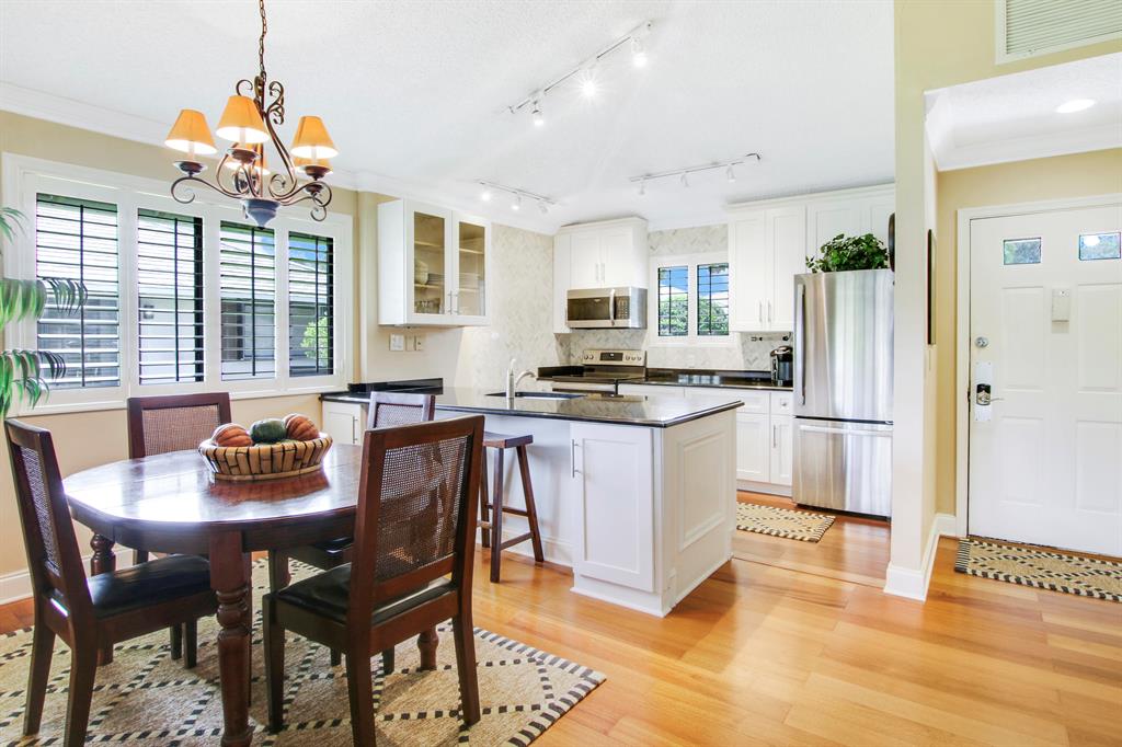 Photo of 915 Club Drive, Palm Beach Gardens, FL 33418 (MLS # R10875934)