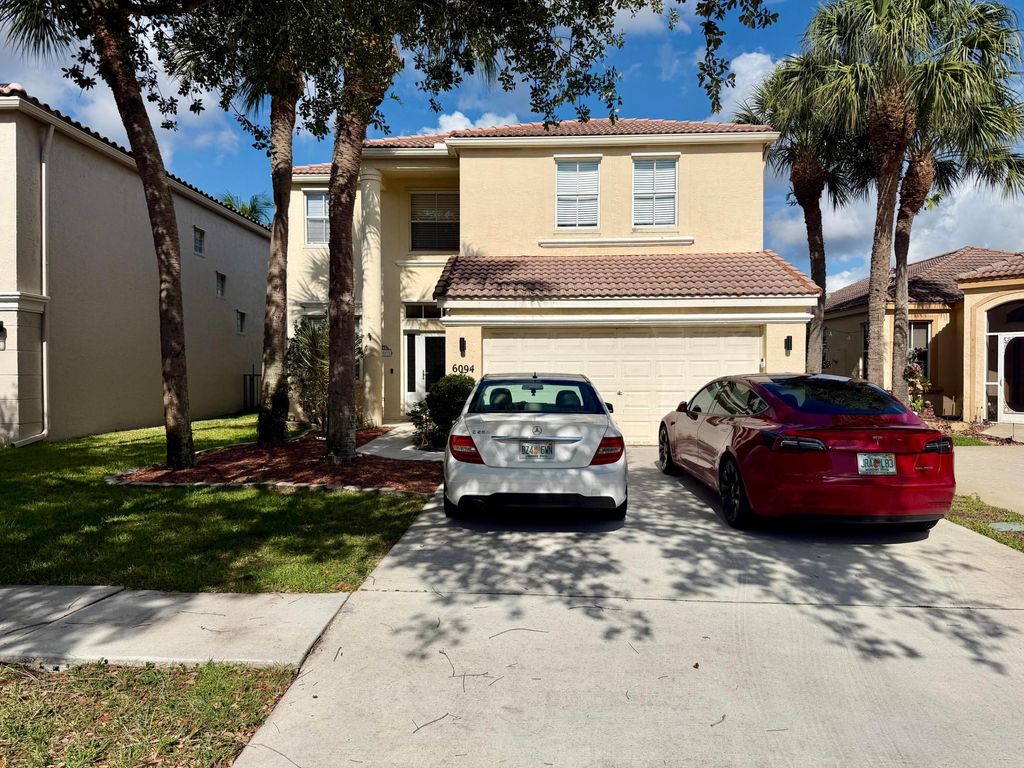 Photo of 6094 Oak Bluff Way, Lake Worth, FL 33467 (MLS # B26021170)