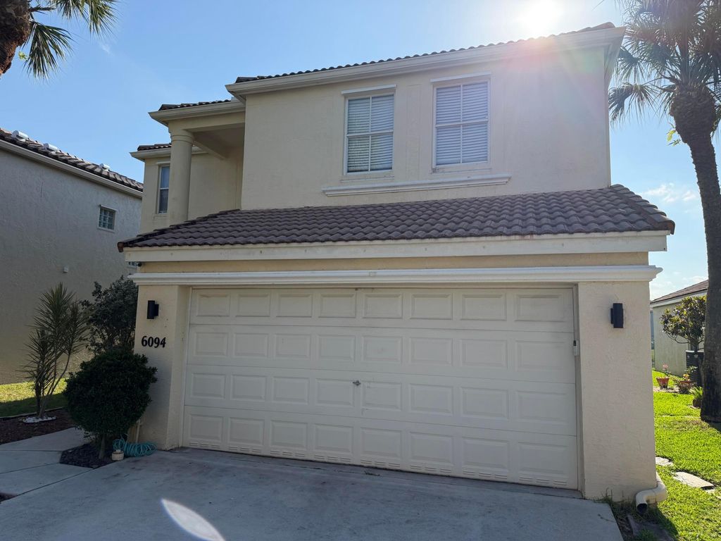 Photo of 6094 Oak Bluff Way, Lake Worth, FL 33467 (MLS # B26021170)
