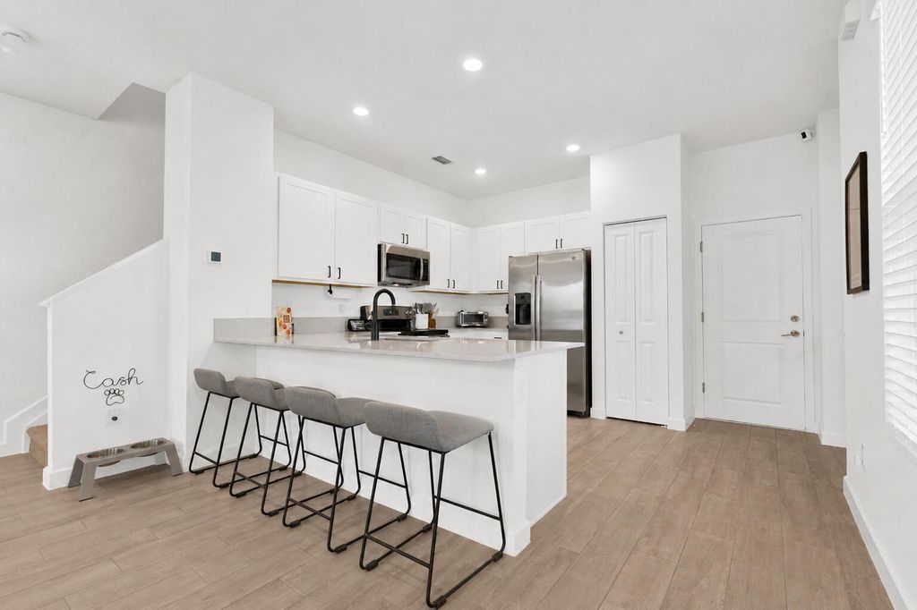 Photo of 4246 Lagoon Shore Drive, Greenacres, FL 33467 (MLS # B26030212)