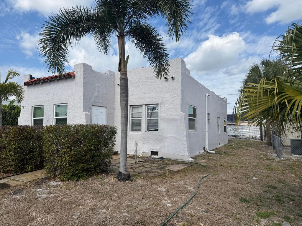 Photo of 717 Selkirk Street, West Palm Beach, FL 33405 (MLS # R11162777)