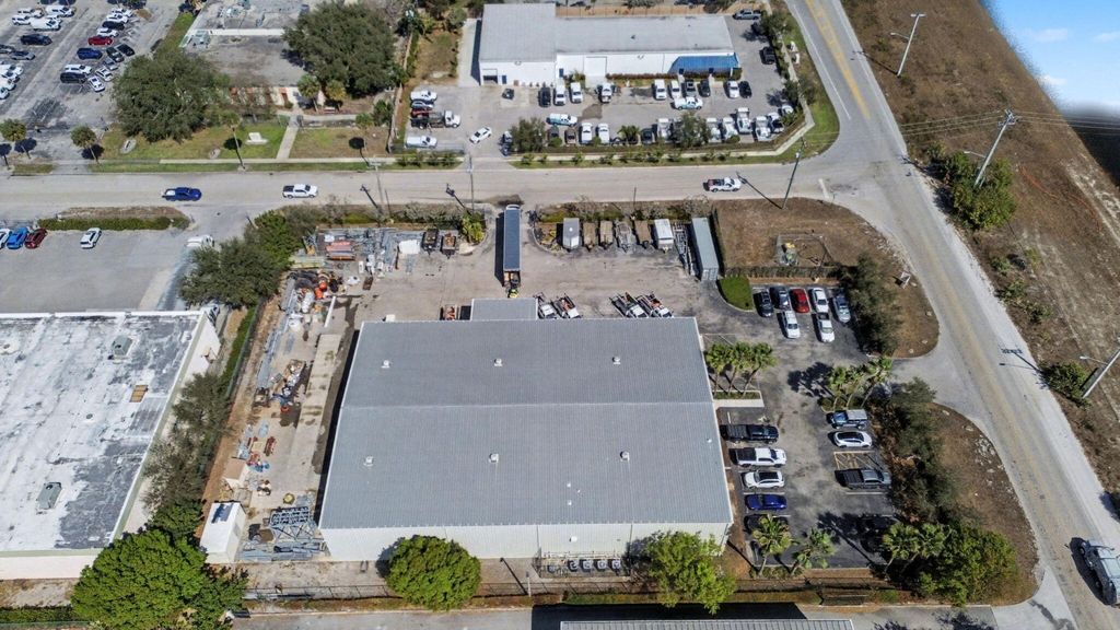 Photo of 6861 Garden Road, Riviera Beach, FL 33404 (MLS # R11168466)