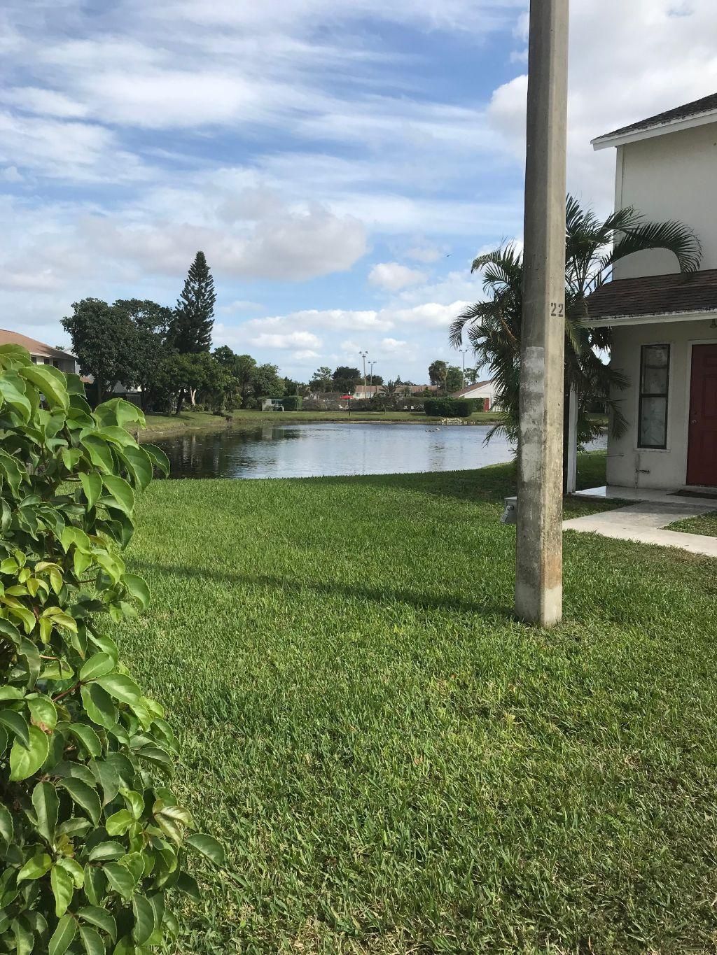 Photo of 5402 Bayside Drive, Greenacres, FL 33463 (MLS # R11096219)