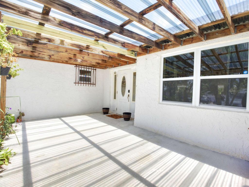 Photo of 218 S Sequoia Drive, West Palm Beach, FL 33409 (MLS # R11116656)