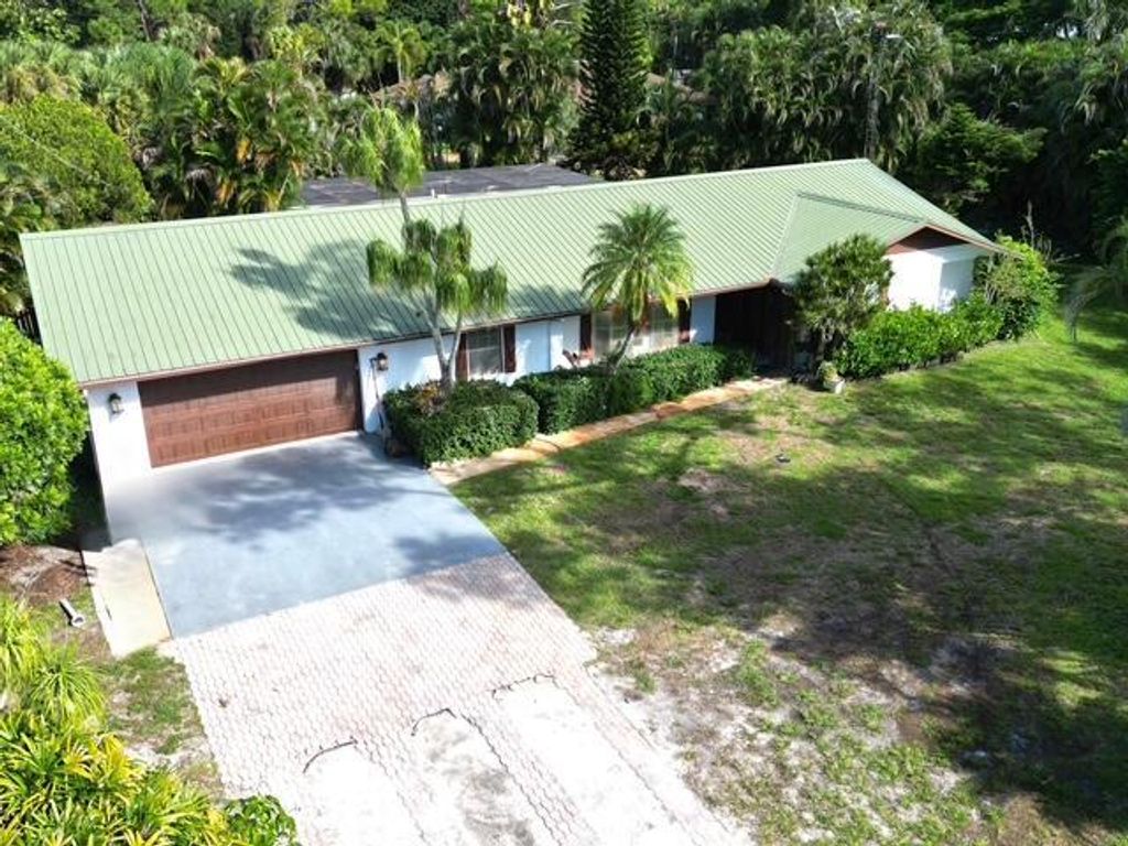 Photo of 6185 Gun Club Road, West Palm Beach, FL 33415 (MLS # R11126802)