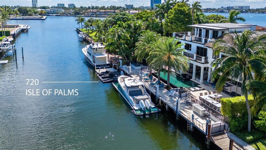 The epitome of luxury, comfort and style, this waterfront estate is ideally located on the cul-de-sac of the prestigious Isle of Palms, 2 in from the point,100 feet of waterfront with direct,fast ocean access, majestic views of the New River from the 3rd floor terrace. Designed by Randall Stofft, the residence features 6 bed, 6 bath, 2 half baths, his & hers office, a den, including in-laws quarters: separate large living area, a full-size bedroom and kitchenette,3-car garage. Completely remodeled in 2023, Italkraft kitchen,high-end appliances,double island, bar/entertaining area, large temperature-controlled wine cellar, impact windows. The outdoor oasis features a large covered patio for al-fresco dining,outdoor kitchen,saltwater infinity edge pool & spa,full house generator,natural gas This exceptional estate offers the ultimate in privacy and luxury: over 8,200 sq ft of air-conditioned living space, a massive wine cellar (~3,000 bottles) with tasting counter, live aquarium, full bar, outdoor kitchen with natural gas, expansive covered patio for al fresco dining, sophisticated entertaining areas, his and hers office ( 2 offices), 100 ft of dockage, and stunning views of the New River and sandbar, in-law quarters with living area, kitchenette, bedroom and full bath, expansive 3rd floor terrace for sunrise and sunset, wide-water views.