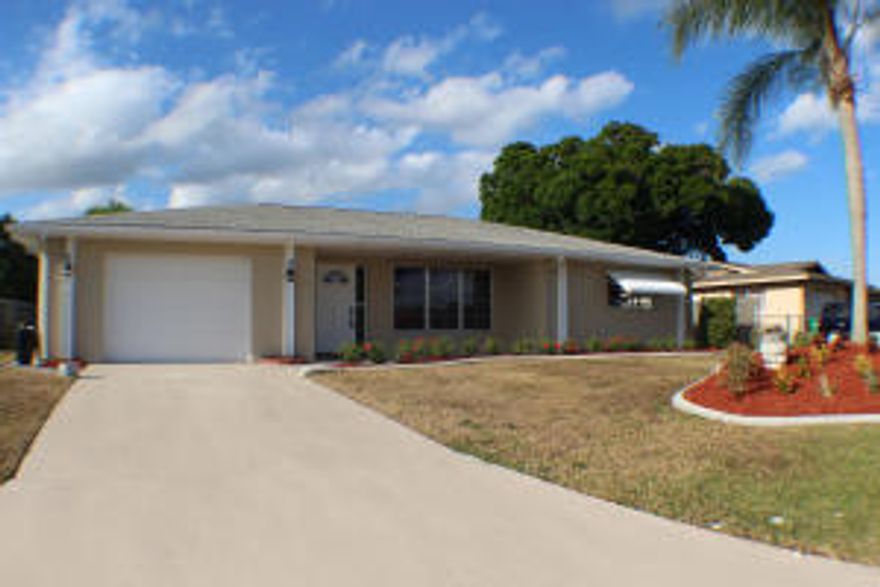 ''Just as good as New!'' This cozy 2 bedroom, 2 bath, single car garage home comes complete with a screened enclosed in-ground swimming pool. Imagine as you watch the children splash in the pool while you grill up a yummy meal in the spacious back yard. This home has been completely renovated and is ready for you to move into today.  Featuring a brand new kitchen complete with new cabinets, new stainless steel appliances, and granite counter tops. New tile has been installed in the kitchen and baths.  Did I mention brand new carpet that has recently been installed too. Close to shopping, dining, hospitals, beaches, I-95, the Florida Turnpike, and so much more. Now available, however not for long...