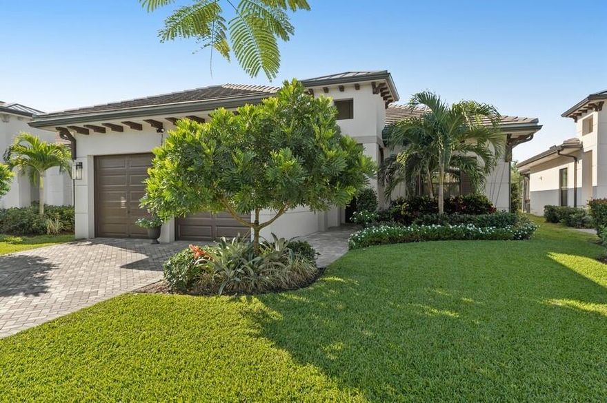 Experience West Palm's best kept secret; a modern, move-in ready home w/ every luxury upgrade, minutes from downtown yet tucked in a quiet gated enclave. Perfect for those craving convenience, style & serenity in one! Luxury Living. Modern Finishes. Exclusive Community. Convenient Location. 6 miles to our beautiful beaches & renowned Worth Ave, 4 miles to PBIA. Discover this stunning 2022-built lakefront home in Residences at Banyan Cay. Located adjacent to the newly unveiled DUTCHMAN'S PIPE Golf Course, featuring a Jack Nicklaus Signature golf course & state-of-the-art racquet center. Designed for effortless living, this one-level, 3BR/3.5BA/2CG home has impact windows/doors, a concrete tile roof & an array of high-end upgrades. Step inside to discover a bright, open floor plan