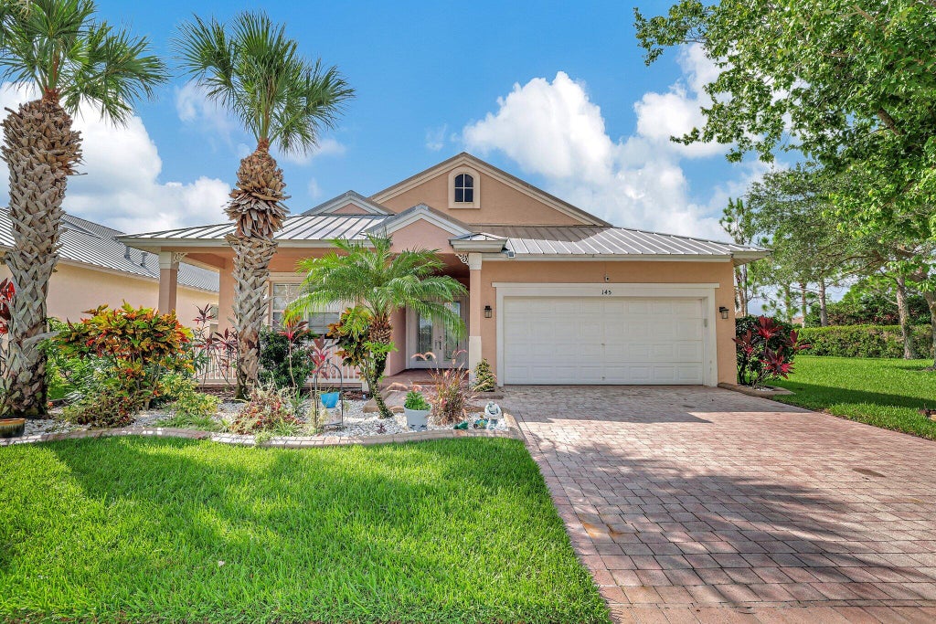 Photo of 145 NW Willow Grove Avenue, Port Saint Lucie, FL 34986 (MLS # R11007151)