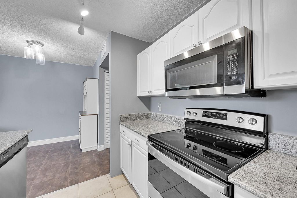 Photo of 1625 Meadows Circle W, Boynton Beach, FL 33436 (MLS # R11086080)