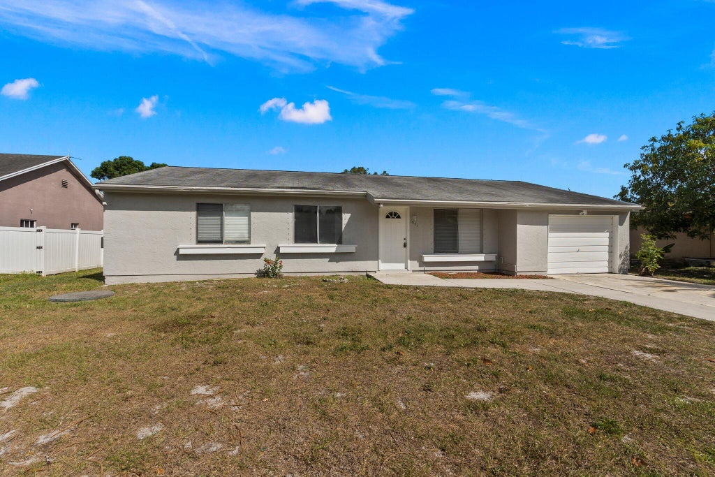Photo of 1971 SE Carvalho Street, Port Saint Lucie, FL 34983 (MLS # R11103010)