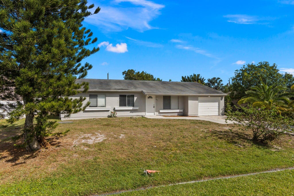Photo of 1971 SE Carvalho Street, Port Saint Lucie, FL 34983 (MLS # R11103010)