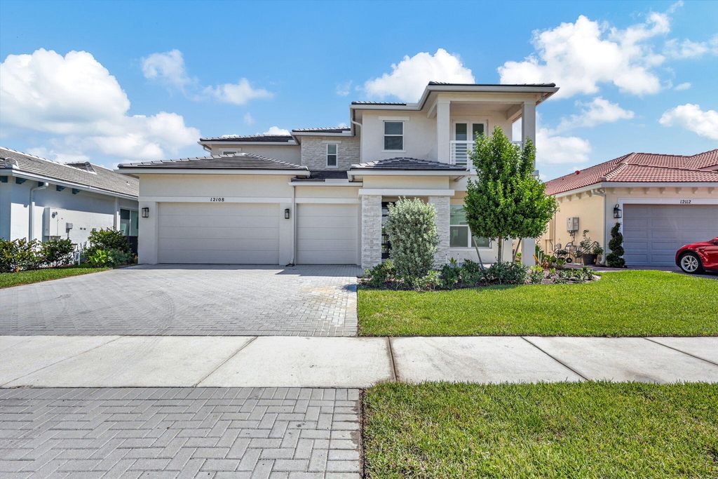 Photo of 12108 Waterstone Circle, Palm Beach Gardens, FL 33412 (MLS # R10994673)