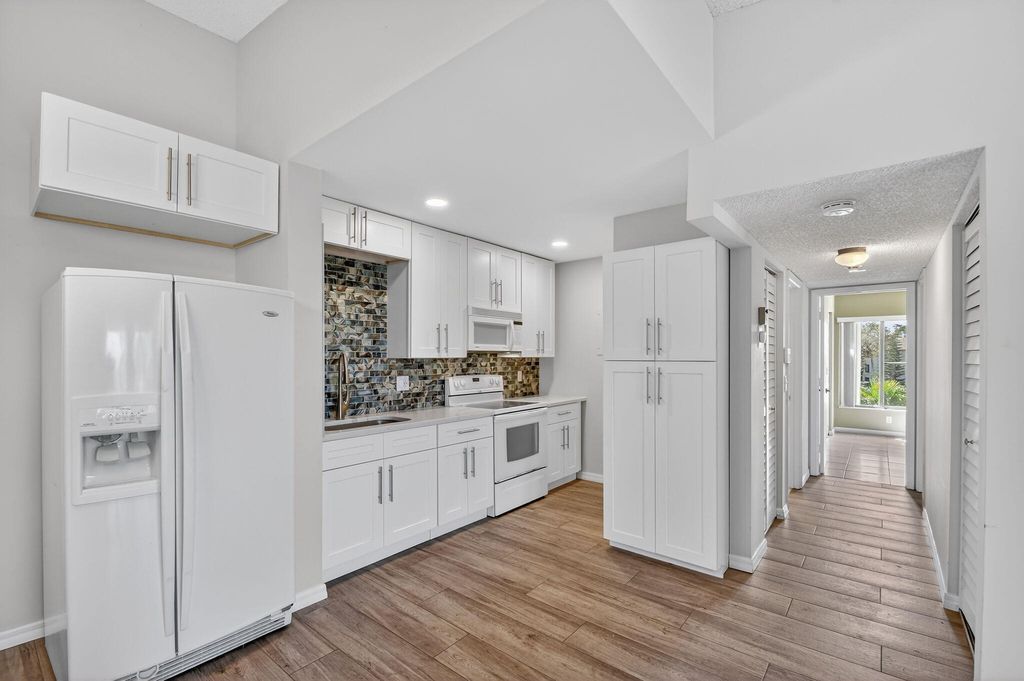 Photo of 812 Sky Pine Way #D3, Greenacres, FL 33415 (MLS # B26001910)