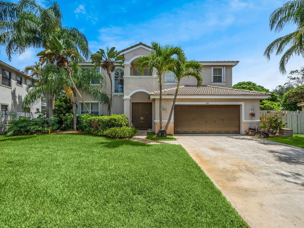 Photo of 6211 Shadow Tree Lane, Lake Worth, FL 33463 (MLS # R11107211)