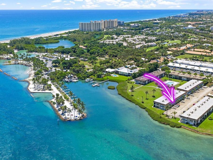 Charming 2BR/2BA condo in a peaceful 55+ waterfront community in the heart of Jupiter. This bright second-floor unit features an open layout and a private screened balcony just steps from the Intracoastal and minutes to the beach. The bright, white kitchen offers ample cabinet space. The primary suite includes a walk-in closet and en-suite bath. Recent upgrades include a new A/C, water heater, and roof (all within the past year). Laundry room located just two doors down. Community amenities include a waterfront pool and dock. Close to Harbourside Place, dining, shopping, and more.