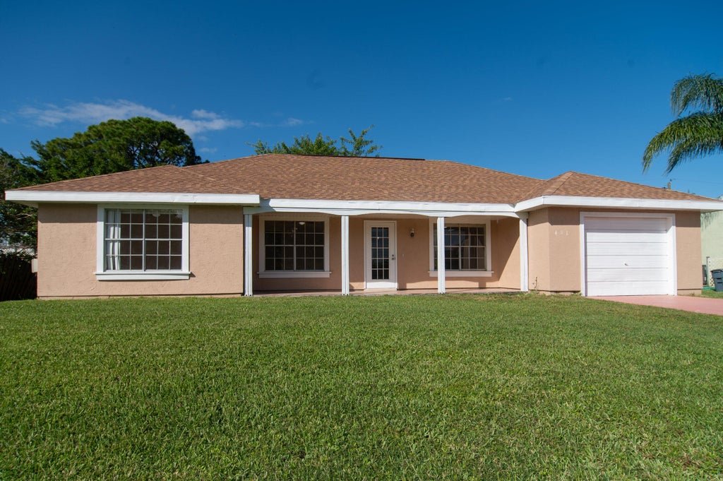Photo of 431 SE Lancaster Avenue, Port Saint Lucie, FL 34984 (MLS # R10947744)