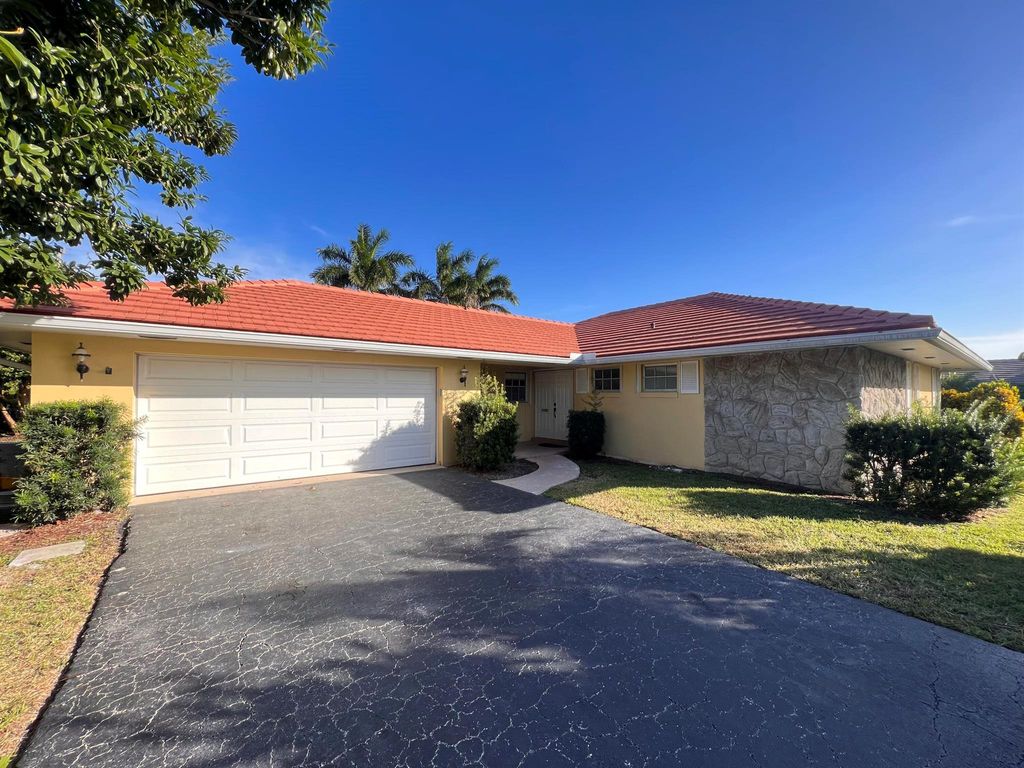 Photo of 216 Gleneagles Drive, Atlantis, FL 33462 (MLS # R11139699)
